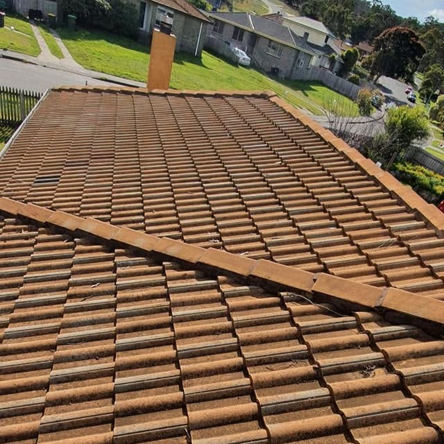 Clean roof after pressure washing