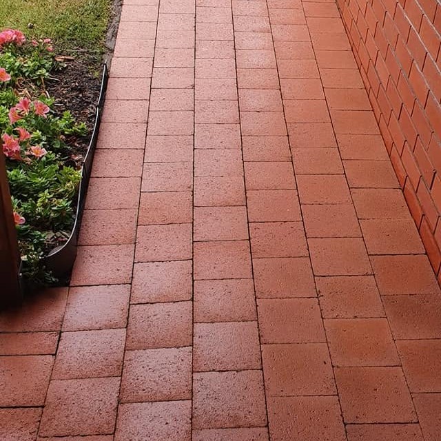 Pressure washing patio surface